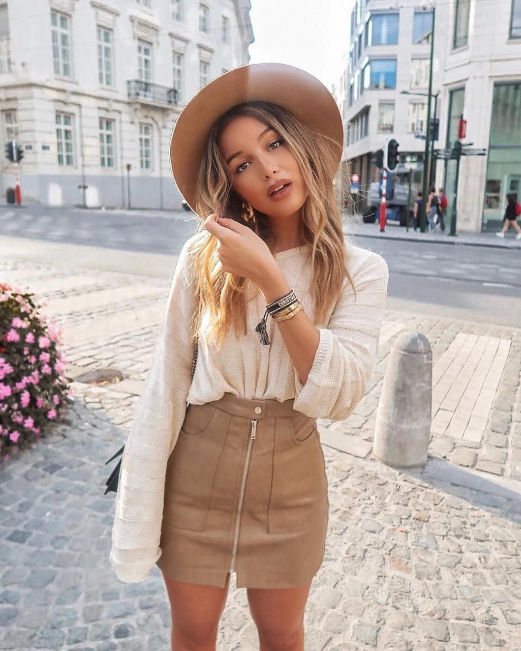 Cute beige leather skirt and hat with comfy winter white sweater. | Leather skirt outfit winter, Fashion outfits, Leather skirt outfit